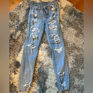 American Eagle Size 8 Regular Light Blue Very Distressed Stretchy Skinny Jeans